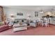 Bright dining area with table and chairs, adjacent to living area at 9400 Shore Dr. # 818, Myrtle Beach, SC 29572