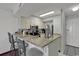 Galley kitchen with granite counters and stainless steel appliances at 9400 Shore Dr. # 818, Myrtle Beach, SC 29572