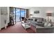 Ocean view living room with comfortable seating and coastal decor at 9400 Shore Dr. # 818, Myrtle Beach, SC 29572