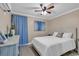 Bright bedroom with a comfortable bed and dresser at 9540 Shore Dr. # 1-H, Myrtle Beach, SC 29572