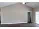 Spacious living room with high ceilings and sliding glass doors at Tbd 9 Woodlawn Dr., Loris, SC 29569