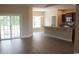 Open living room with kitchen and sliding doors to patio at Tbd 9 Woodlawn Dr., Loris, SC 29569