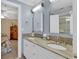 This bathroom features a granite countertop with double sinks at 118 Oatland Lake Rd., Pawleys Island, SC 29585