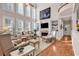 Two story living room with hardwood floors and fireplace at 118 Oatland Lake Rd., Pawleys Island, SC 29585