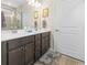 Bathroom with a double vanity and modern fixtures at 1262 Witch Hazel Way, Longs, SC 29568