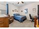 Cozy bedroom with a comfortable bed and a home office at 1262 Witch Hazel Way, Longs, SC 29568