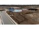 Aerial view of community amenities, including a pool, dog park, and tennis courts at 1262 Witch Hazel Way, Longs, SC 29568