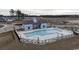 Community pool with a pool house and plenty of lounge chairs at 1262 Witch Hazel Way, Longs, SC 29568