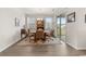 Bright dining room with table and chairs, and access to a porch at 1262 Witch Hazel Way, Longs, SC 29568