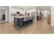 Bright kitchen featuring a large island and stainless steel appliances at 1262 Witch Hazel Way, Longs, SC 29568