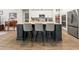 Modern kitchen with a large island and stainless steel appliances at 1262 Witch Hazel Way, Longs, SC 29568