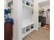 Convenient laundry area with built-in storage and bench at 1262 Witch Hazel Way, Longs, SC 29568