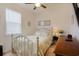 Cozy bedroom with a metal bed frame and a dresser at 127 Marauder Dr., Longs, SC 29568