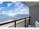 Breathtaking ocean view from a private balcony with comfortable seating and scenic blue skies at 1501 S Ocean Blvd. # 1442, Myrtle Beach, SC 29577