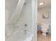 Clean bathroom featuring a shower and a white toilet at 1501 S Ocean Blvd. # 1442, Myrtle Beach, SC 29577