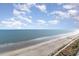 Sweeping view of the shoreline from above, showcasing calm waters and sandy beaches at 1501 S Ocean Blvd. # 1442, Myrtle Beach, SC 29577
