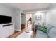 Charming living room showcasing modern decor and a glimpse of the fully-equipped kitchen at 1501 S Ocean Blvd. # 1442, Myrtle Beach, SC 29577