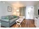 Cozy living room featuring a comfortable sofa, stylish coffee table, and tasteful decor at 1501 S Ocean Blvd. # 1442, Myrtle Beach, SC 29577