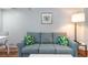 Inviting living area with a plush sofa, tropical-themed cushions, and modern furnishings at 1501 S Ocean Blvd. # 1442, Myrtle Beach, SC 29577