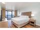 Relaxing main bedroom with a comfortable king-size bed and ocean view balcony access at 1501 S Ocean Blvd. # 1442, Myrtle Beach, SC 29577