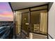 A balcony featuring seating, sliding glass doors and a partial view of the interior at 1501 S Ocean Blvd. # 1549, Myrtle Beach, SC 29577