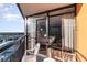 A balcony featuring chairs, a railing and partial view of the interior at 1501 S Ocean Blvd. # 1549, Myrtle Beach, SC 29577