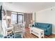 Bright living room featuring wood floors, comfortable furniture, and natural lighting at 1501 S Ocean Blvd. # 1549, Myrtle Beach, SC 29577