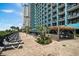 Relaxing resort pool deck featuring lounge chairs and shaded cabanas at 1501 S Ocean Blvd. # 1549, Myrtle Beach, SC 29577