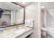 Well-lit bathroom with granite countertop vanity, fresh towels, and shower/tub combo at 1501 S Ocean Blvd. # 251, Myrtle Beach, SC 29577