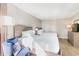 Cozy bedroom featuring comfortable seating, bright natural light, and two beds at 1501 S Ocean Blvd. # 251, Myrtle Beach, SC 29577