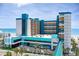 Exterior shot of resort with multiple levels and ocean views at 1501 S Ocean Blvd. # 251, Myrtle Beach, SC 29577