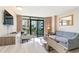 Inviting living room with sliding glass doors opening to balcony views at 1501 S Ocean Blvd. # 251, Myrtle Beach, SC 29577