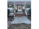 Brick steps leading to the front door, decorated for Christmas at 2064 Martin St., Loris, SC 29569