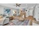 Bright and airy living room with comfortable sectional sofa and large TV at 22 Trigger Fish Ln., Murrells Inlet, SC 29576