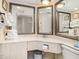 Bathroom with double vanity, toilet and mirrored medicine cabinets at 2406 N Ocean Blvd. # 604, Myrtle Beach, SC 29577