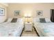 Bedroom with two double beds and a shared night stand at 2406 N Ocean Blvd. # 604, Myrtle Beach, SC 29577