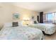 Bedroom with two double beds and ocean view at 2406 N Ocean Blvd. # 604, Myrtle Beach, SC 29577