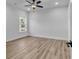 Bright bedroom featuring hardwood floors and a ceiling fan at 33 Captains Pl, Murrells Inlet, SC 29576