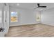 View of the bedroom showing the window, flooring, ceiling fan, closet and trim at 33 Captains Pl, Murrells Inlet, SC 29576