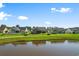 Community overview showcasing homes and a pond at 4041 Comfort Valley Dr., Longs, SC 29568