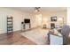 Living room with hardwood floors, gray couch and access to back patio at 407 Mckendree Ln., Myrtle Beach, SC 29579