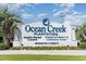 Ocean Creek Plantation entrance sign, indicating resort amenities at 415 Ocean Creek Dr. # 2280, Myrtle Beach, SC 29572