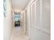 Bright hallway with tile floors and built-in storage at 415 Ocean Creek Dr. # 2280, Myrtle Beach, SC 29572