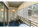 Relaxing screened balcony with table and chairs at 415 Ocean Creek Dr. # 2280, Myrtle Beach, SC 29572