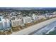 Aerial view of oceanfront property, showcasing building and beach at 4619 S Ocean Blvd. # 207, North Myrtle Beach, SC 29582