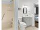 Bathroom featuring a shower/tub combo and gray vanity at 4619 S Ocean Blvd. # 207, North Myrtle Beach, SC 29582