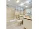 Tub/shower combo, tiled floor, beach-themed decor at 4619 S Ocean Blvd. # 207, North Myrtle Beach, SC 29582