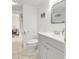 Clean bathroom with gray vanity, toilet and shower/tub at 4619 S Ocean Blvd. # 207, North Myrtle Beach, SC 29582