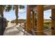 Convenient beach access walkway with outdoor shower at 4619 S Ocean Blvd. # 207, North Myrtle Beach, SC 29582