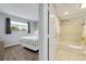 Bedroom with en-suite bathroom, double bed, ocean view at 4619 S Ocean Blvd. # 207, North Myrtle Beach, SC 29582